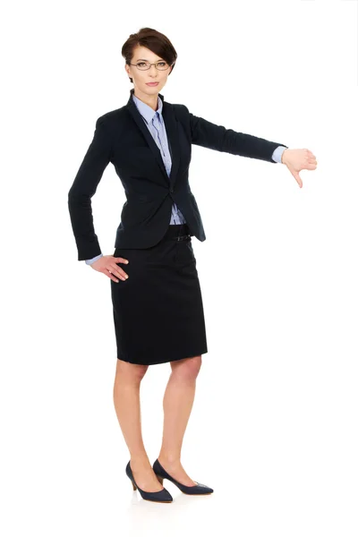 Obchodní žena ukazuje palec dolů. — Stock fotografie