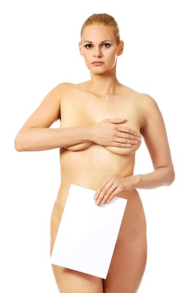 Jeune femme nue tenant bannière vierge — Photo