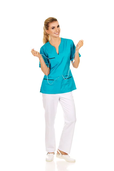 Smiling nurse or doctor holding a drip — Stock Photo, Image