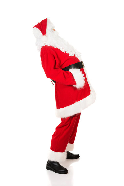 Full length Santa Claus grabbing his belly