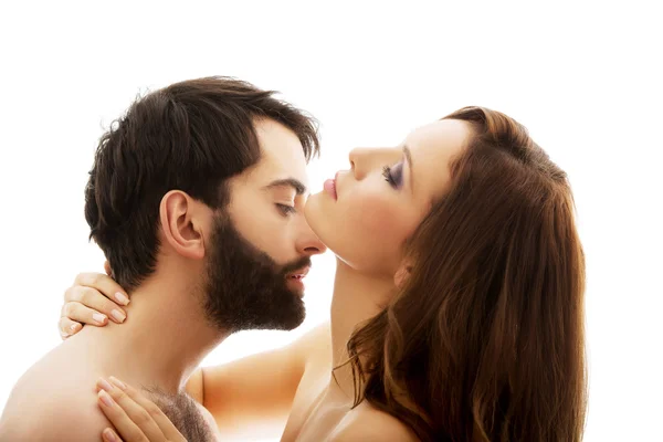 Man pretending to kiss womans neck. — Stock Photo, Image