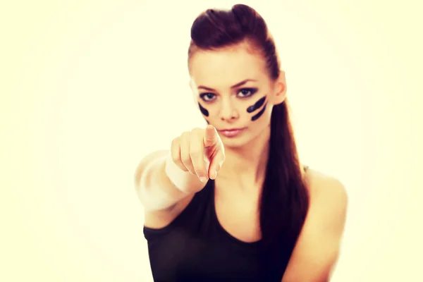 Young soldier woman pointing at camera — Stock Photo, Image