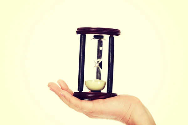 Young business woman holding hourglass-time concept — Stock Photo, Image