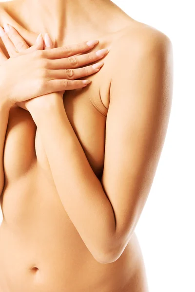 Slim spa woman covering her breast — Stock Photo, Image