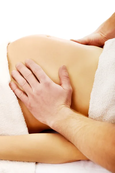 Pregnant woman having a relaxing massage — Stock Photo, Image