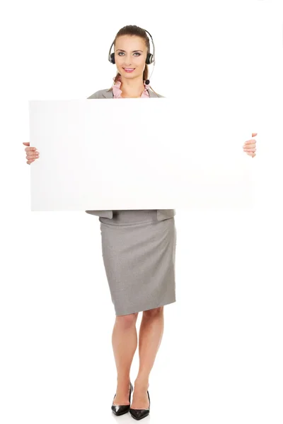 Wywołanie centrum kobieta trzymając pusty transparent. — Zdjęcie stockowe