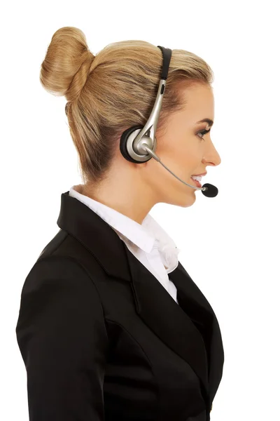 Glückliche junge Geschäftsfrau mit Headset — Stockfoto