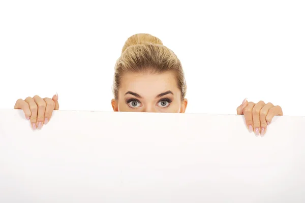 Young businesswoman with surprised eyes — Stock Photo, Image