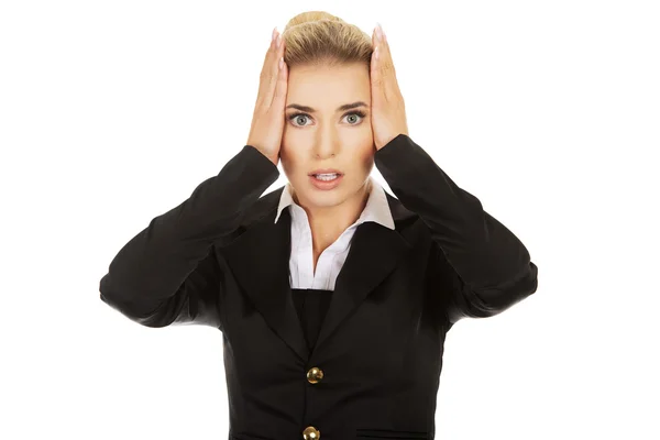 Young shocked businesswoman  olding her head in amazement and op — Stock Photo, Image