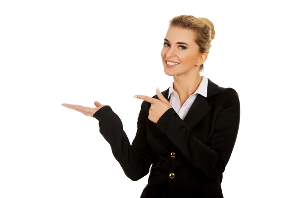 Young busiensswoman showing something — Stock Photo, Image