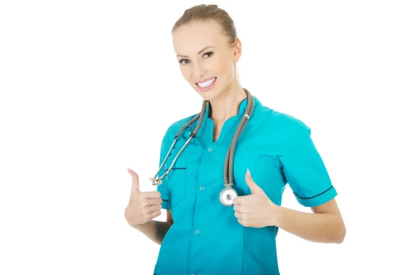 Medico donna con i pollici in su . — Foto Stock