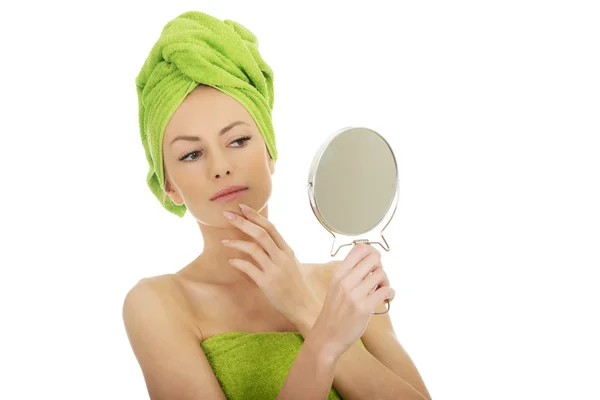 Beautiful woman with a mirror. — Stock Photo, Image