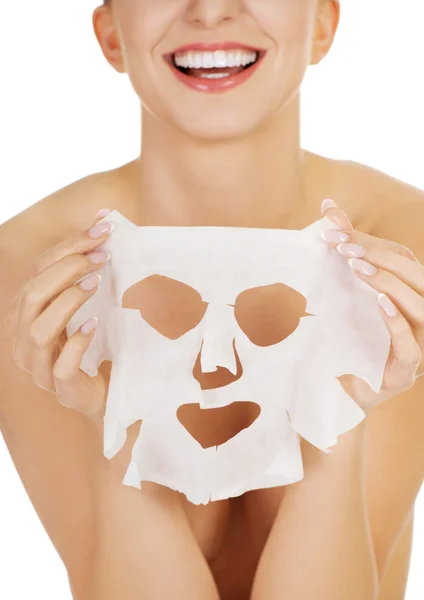 Young happy woman with facial mask. — Stock Photo, Image