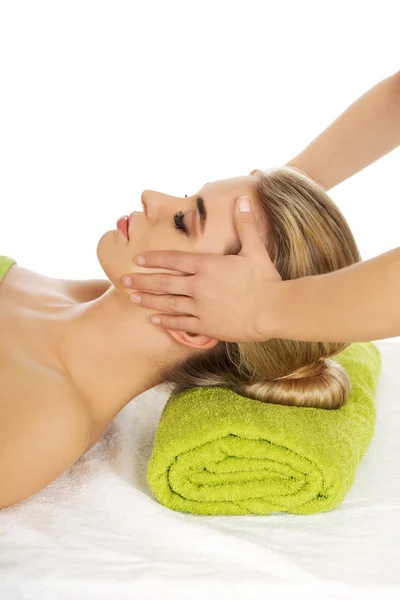 Young woman has face massage. — Stock Photo, Image