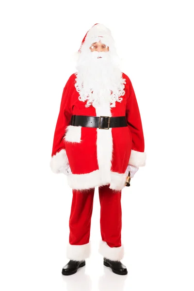 Полноразмерный Санта Клаус держит колокол — стоковое фото