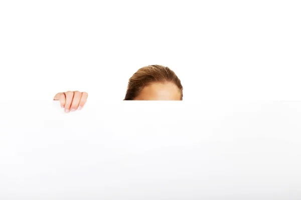 Female doctor or nurse  holding empty banner — Stock Photo, Image