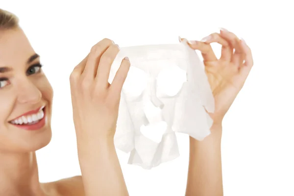 Young happy woman with facial mask — Stock Photo, Image