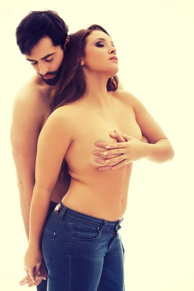 Man covering womans breast. — Stock Photo, Image