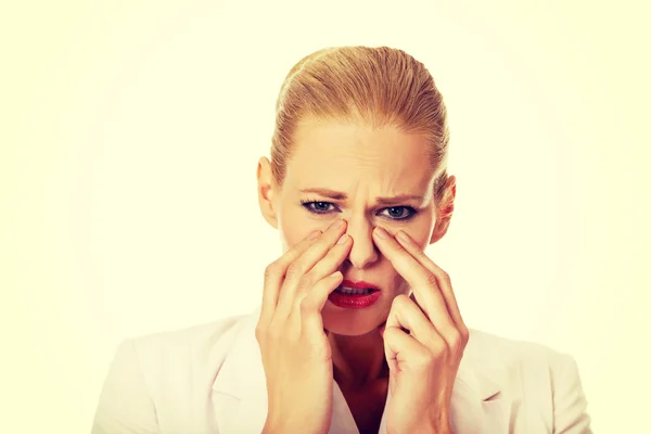 Young business woman with sinus pressure pain — Stock Photo, Image