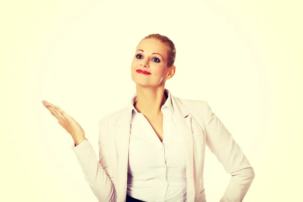 Business woman pointing for copyspace or something — Stock Photo, Image