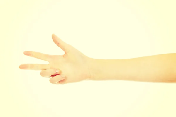 Woman hand shows thee fingers — Stock Photo, Image