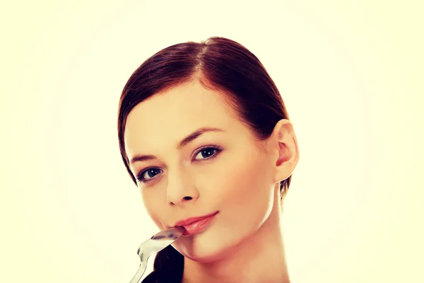 Young woman thinking what to eat — Stock Photo, Image