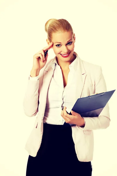 Young smile business woman making a notes — Stock Photo, Image