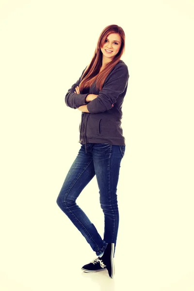 Happy teen woman with folded arms — Stock Photo, Image