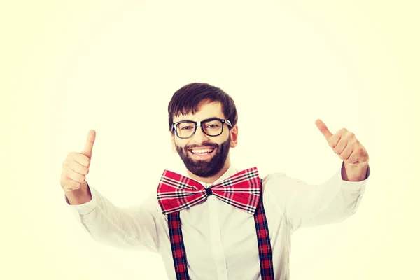 Man wearing suspenders with thumbs up. — Stock Photo, Image