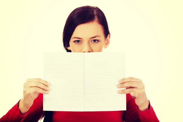 Smile young woman holding blank white banner — Stock Photo, Image