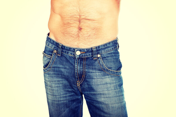 Shirtless men in jeans trousers