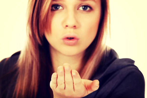 Teenage woman sending a kiss — Stock Photo, Image