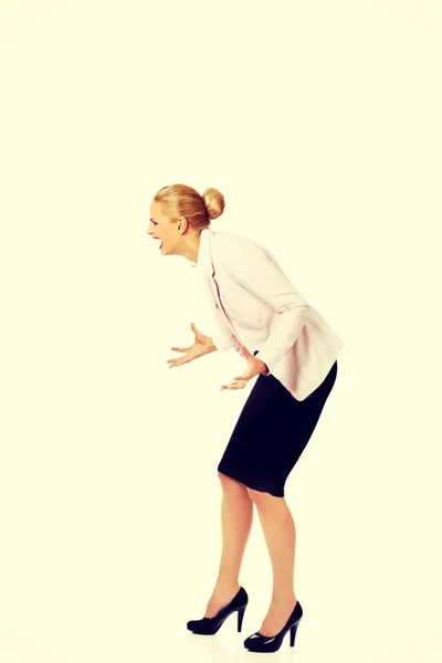 Angry and furious business woman screaming for someone — Stock Photo, Image