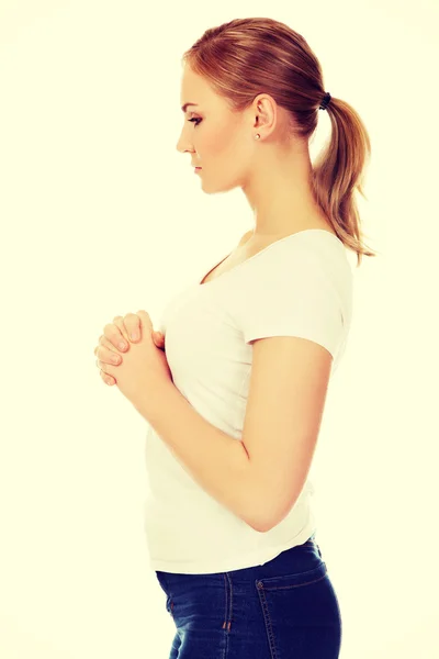 Young woman praying - religion concept — Stock Photo, Image