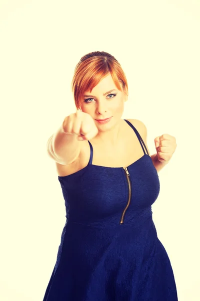 Overweight woman with her fists up — Stock Photo, Image