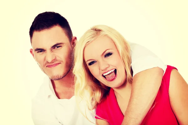 Funny love couple making stupid faces — Stock Photo, Image