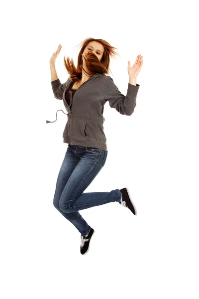 Adolescente feliz mujer saltando en el aire — Foto de Stock