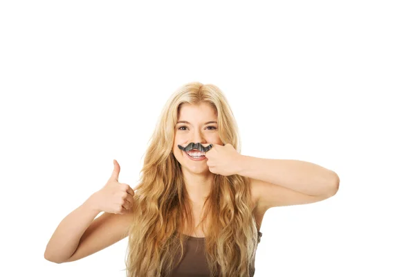 Estudante loira com bigode olhando para a câmera — Fotografia de Stock