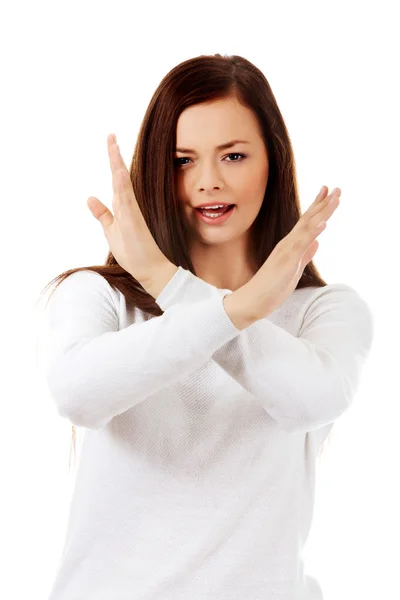 Young angry screaming woman gesturing stop sign Stock Image