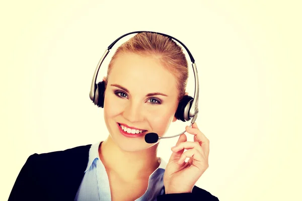 Leende telefonoperatör i hörlurar — Stockfoto