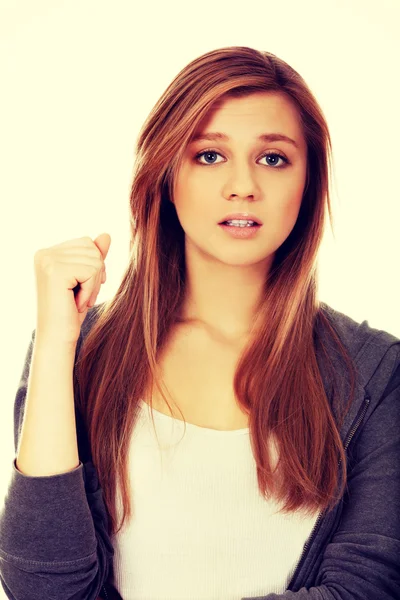 Beautiful teenage woman with shock expression — Stock Photo, Image