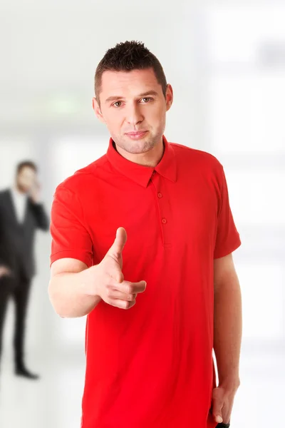 Serious young man pointing you — Stock Photo, Image