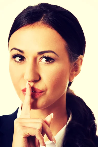 Businesswoman making silent sign — Stock Photo, Image