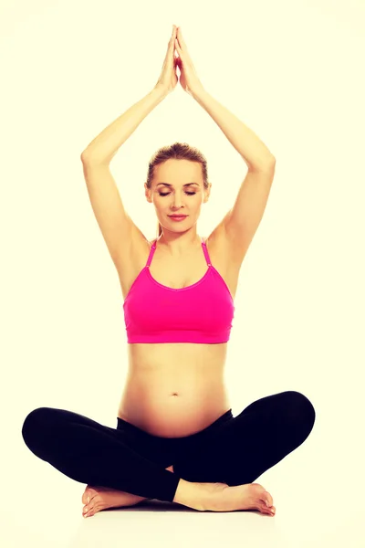 Pregnant woman relax doing yoga — Stock Photo, Image