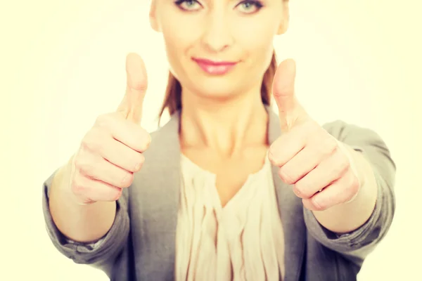 Smiling businesswoman with thumbs up. — Stock Photo, Image