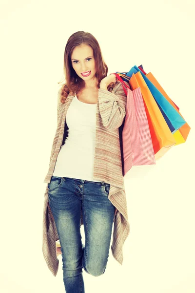 Femme heureuse avec des sacs à provisions. — Photo