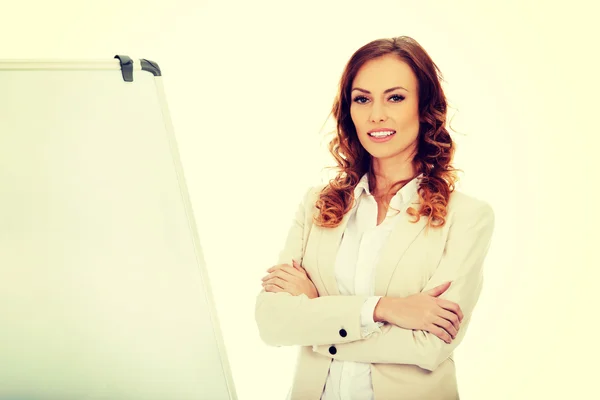 Mujer de negocios cerca de flipchart . —  Fotos de Stock