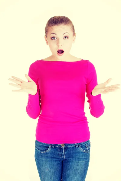 Beautiful casual woman expresses shock. — Stock Photo, Image