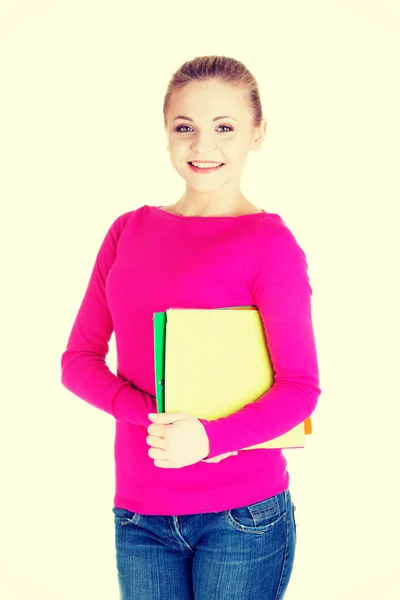 Ung student kvinna med arbetsbok. — Stockfoto