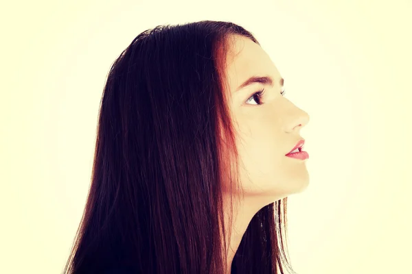 Perfil de beautiful woman looking up . — Fotografia de Stock